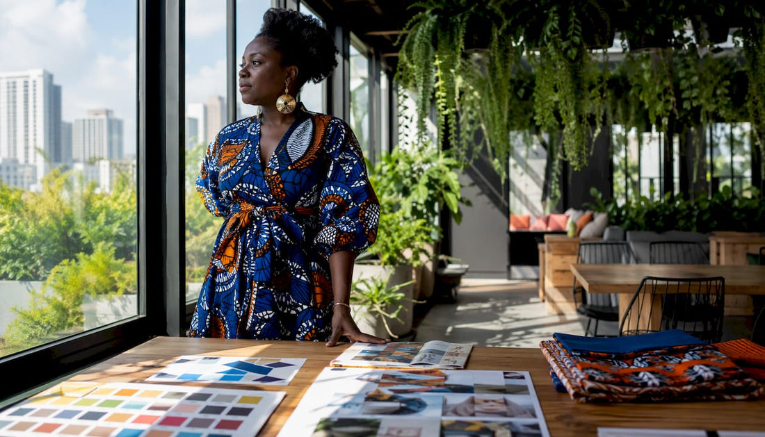 Woman wearing Ankara dress in office